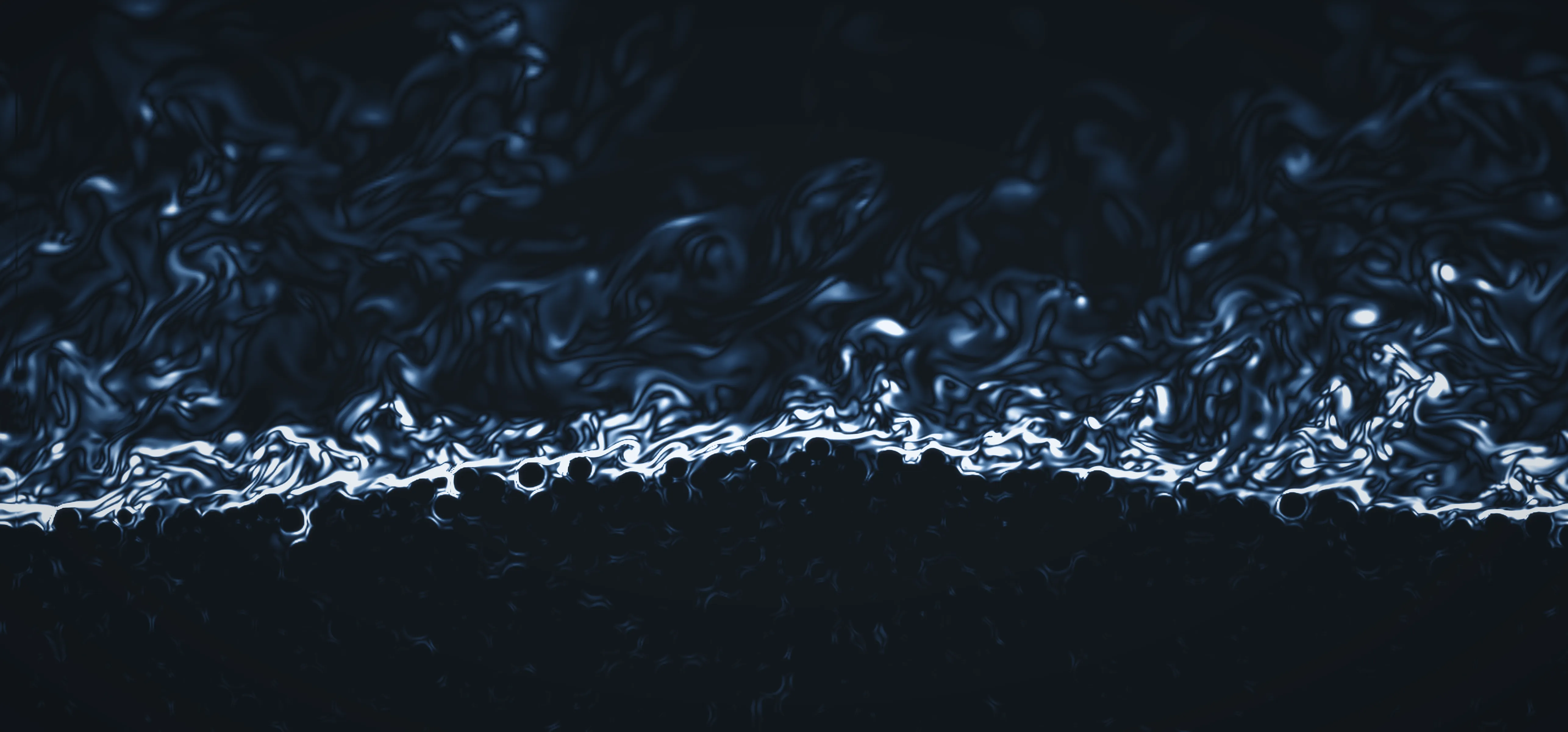 Instantaneous spanwise vorticity of turbulent flow over a mobile sediment bedform: the streamwise-wall-normal plane showing the intense shear layer draping the bed crest and the overlying turbulence.
