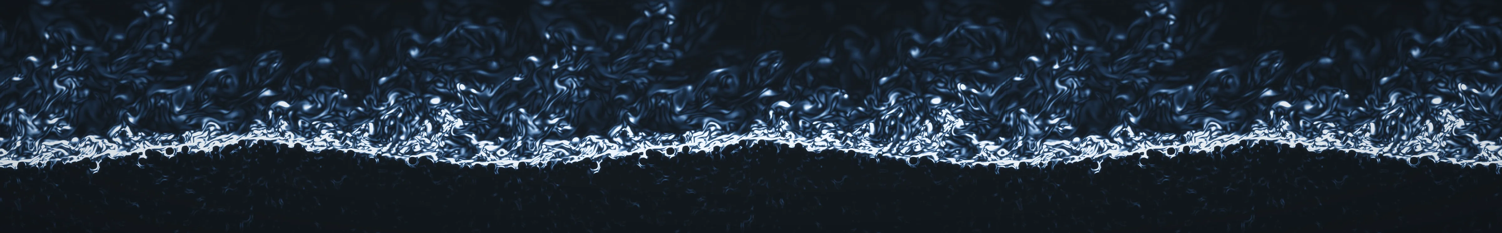 Instantaneous spanwise vorticity of turbulent flow over a mobile sediment bedform: the streamwise-wall-normal plane showing the intense shear layer draping the bed crest and the overlying turbulence.